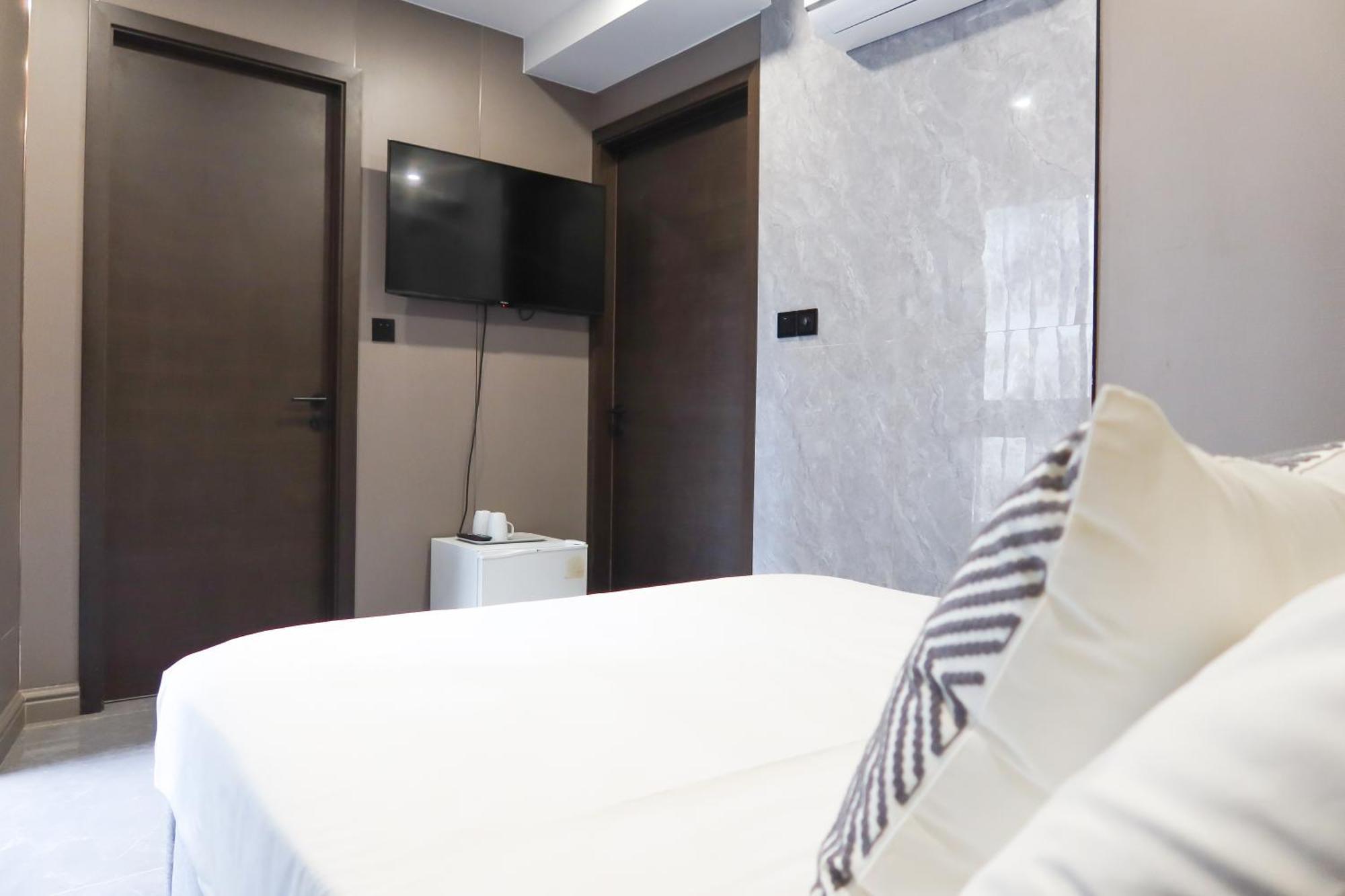 Recharge Studio Apartment & Suites Сингапур Номер фото