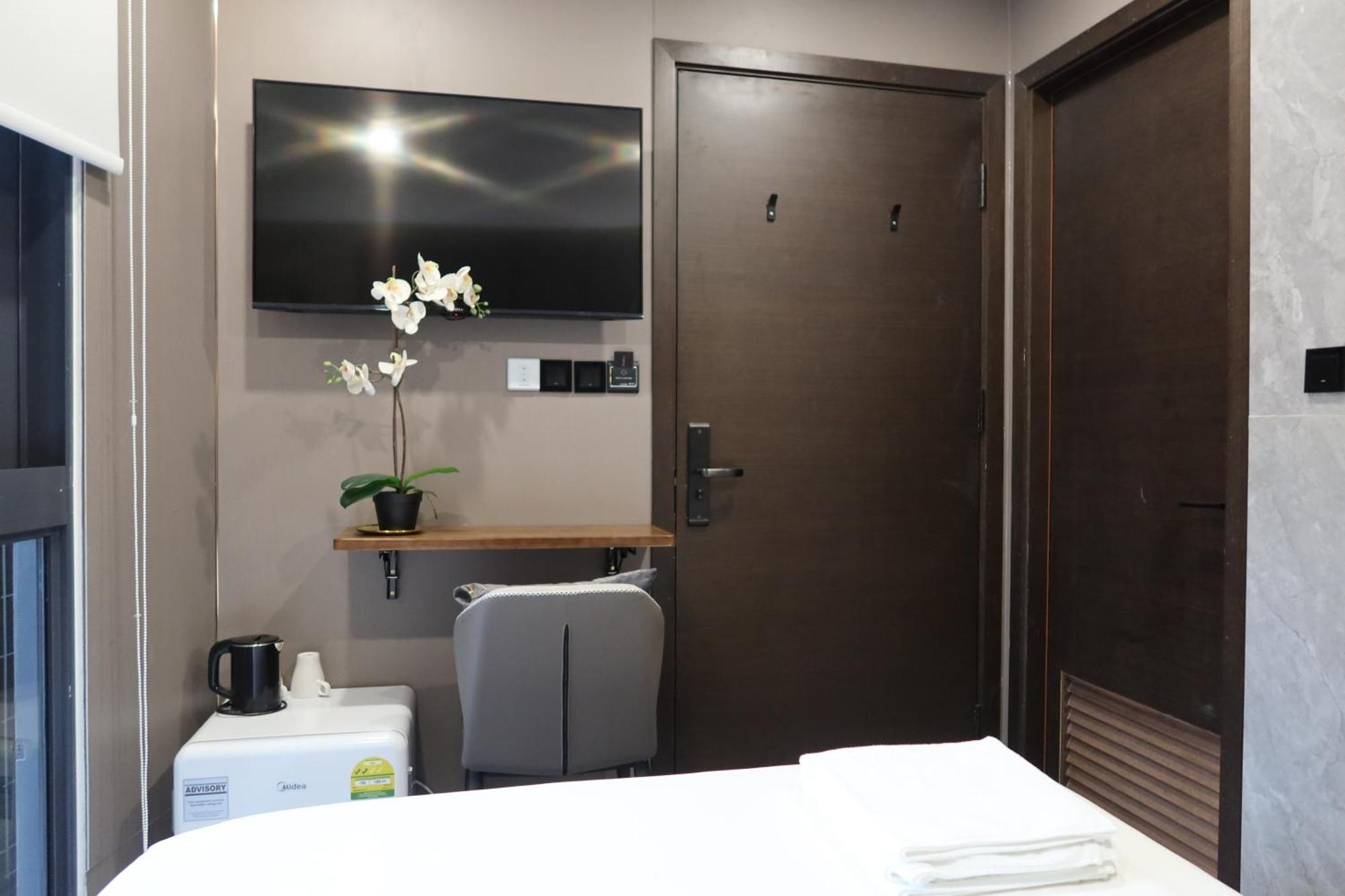 Recharge Studio Apartment & Suites Сингапур Номер фото