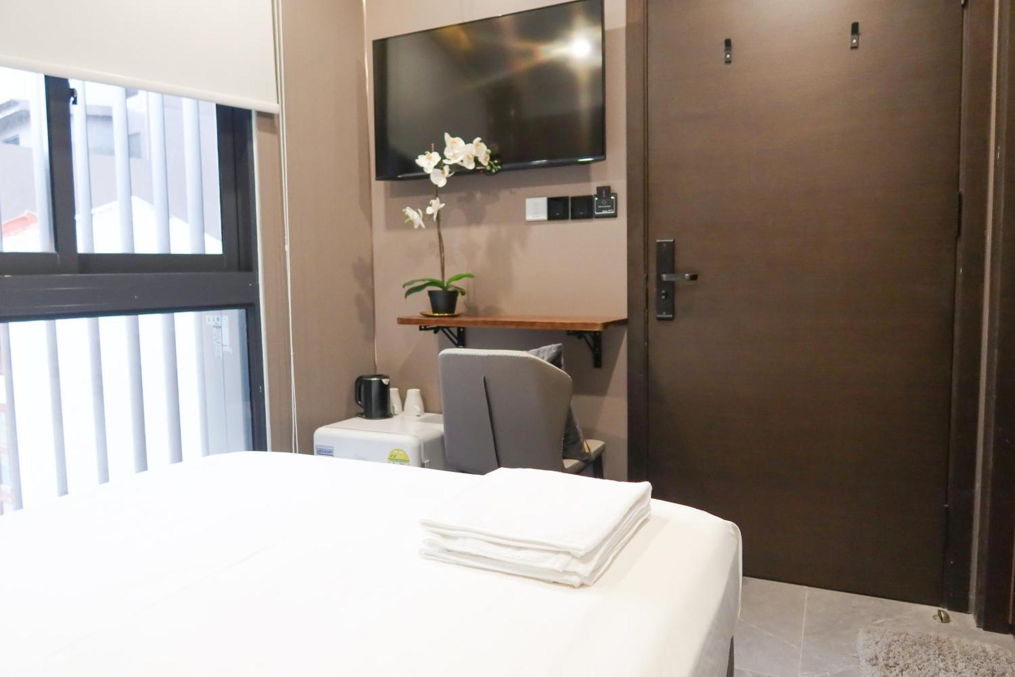 Recharge Studio Apartment & Suites Сингапур Номер фото
